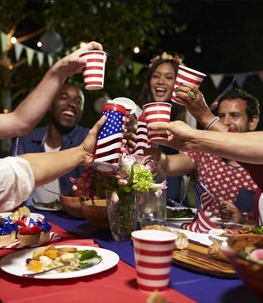 friends drinking wine outside and having fun